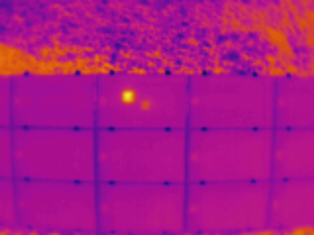 Thermal drone image showing a hotspot on a solar panel